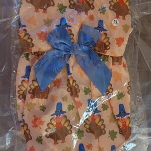 Dog Thanksgiving Turkey Dress with Blue Bow.  Very Small Even Thpugh Says XL